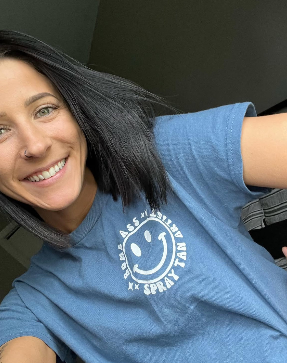 Somebody's Bomb Ass Spray Tan Artist Graphic Tee