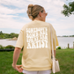 Somebody's Bomb Ass Spray Tan Artist Graphic Tee