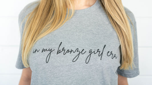In My Bronze Girl Era Graphic Tee (OG Collection)